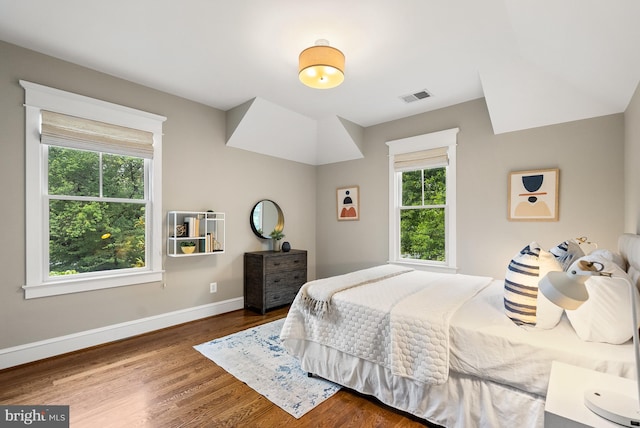 2407 N Nelson St, Arlington, VA 22207 - bedroom featuring multiple windows and wood finished floors