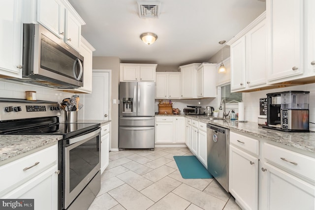 30 Bunker Ln, Etters, PA 17319 - kitchen with stainless steel appliances and white cabinets