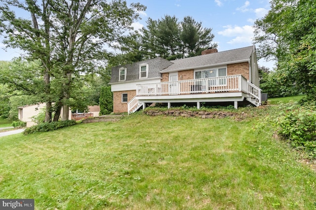 30 Bunker Ln, Etters, PA 17319 - rear view of property with brick siding, stairs, a lawn, and a wooden deck