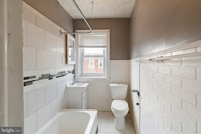 1245 Chase St, Camden, NJ 08104 - bathroom with vanity, tile walls, tile patterned floors, and wainscoting