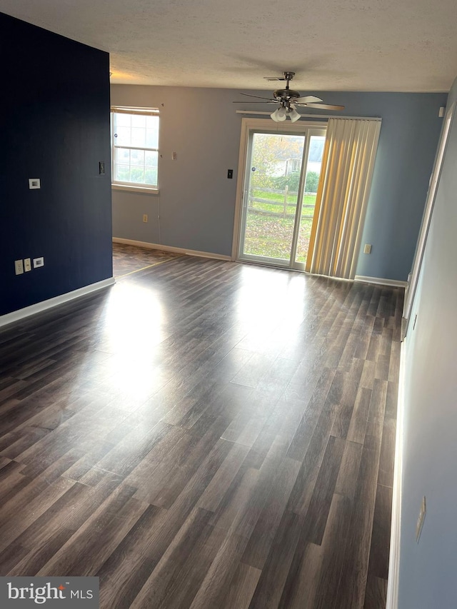 2177 Fawn Ct, Waldorf, MD 20602 - unfurnished room with ceiling fan and dark wood-style flooring