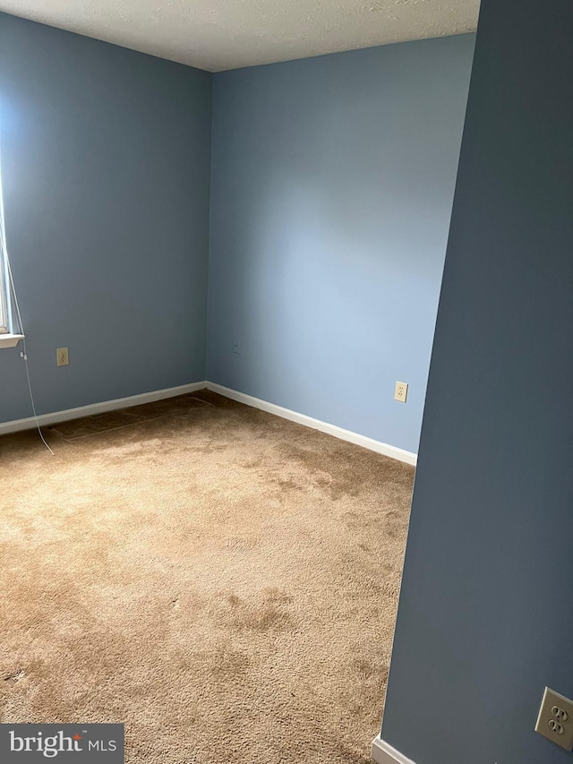 2177 Fawn Ct, Waldorf, MD 20602 - carpeted empty room featuring a textured ceiling