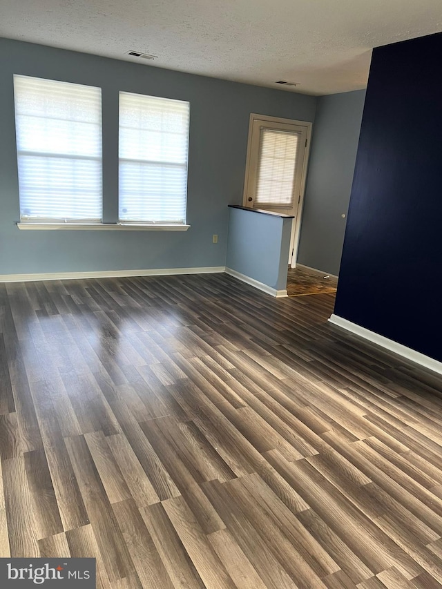 2177 Fawn Ct, Waldorf, MD 20602 - spare room with dark wood finished floors and a textured ceiling