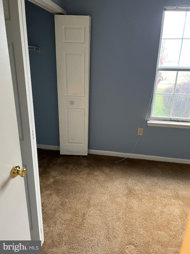 2177 Fawn Ct, Waldorf, MD 20602 - carpeted empty room featuring baseboards