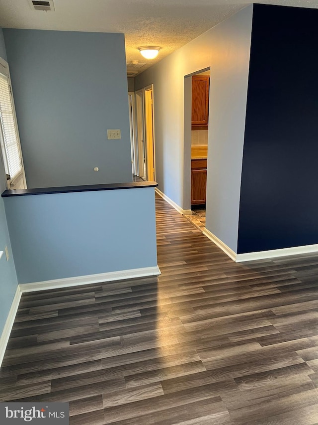 2177 Fawn Ct, Waldorf, MD 20602 - unfurnished room with wood finished floors and a textured ceiling