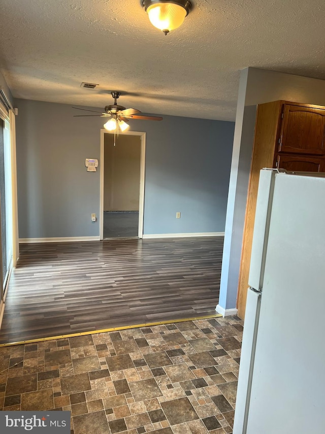 2177 Fawn Ct, Waldorf, MD 20602 - empty room with a ceiling fan and a textured ceiling