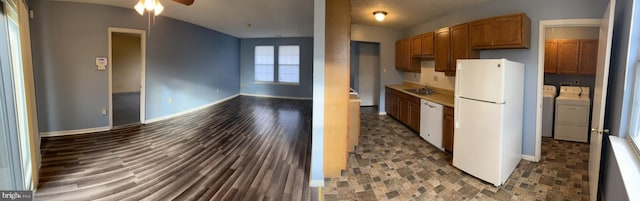 2177 Fawn Ct, Waldorf, MD 20602 - kitchen featuring white appliances, independent washer and dryer, ceiling fan, open floor plan, and light countertops