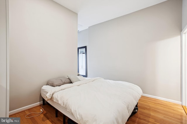 2117 N St NW Unit 2, Washington, DC 20037 - bedroom with baseboards and wood finished floors