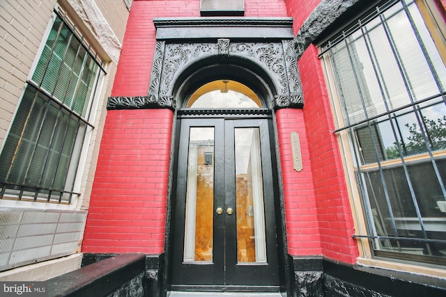 2117 N St NW Unit 2, Washington, DC 20037 - property entrance featuring french doors and brick siding