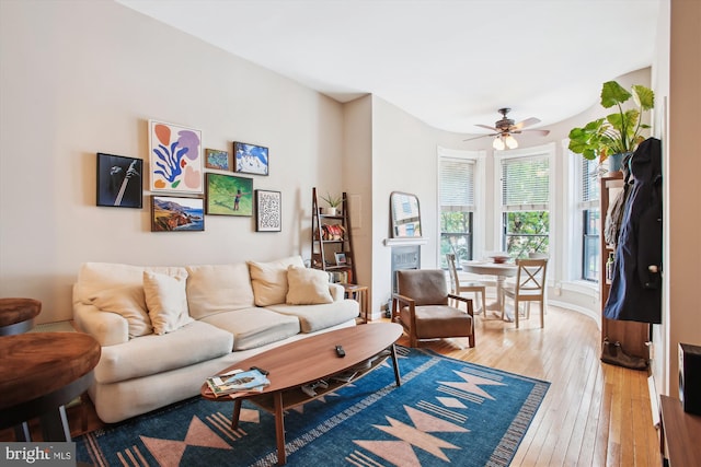 2117 N St NW Unit 2, Washington, DC 20037 - living room with light wood-type flooring and a ceiling fan