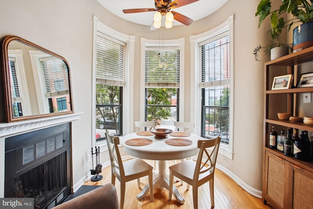 2117 N St NW Unit 2, Washington, DC 20037 - dining space with a ceiling fan, plenty of natural light, and light wood-type flooring