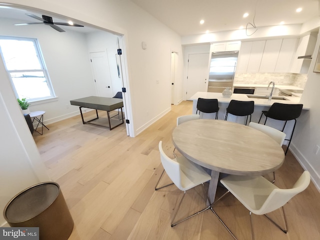 8610 Evergreen Pl Unit 100, Philadelphia, PA 19118 - dining area featuring light wood-style floors, recessed lighting, and a ceiling fan