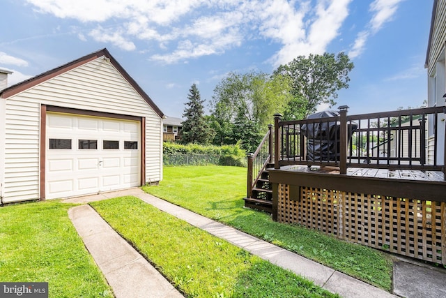 53 Ackerman Ave, Saddle Brook, NJ 07663 - view of green lawn featuring a wooden deck, a garage, an outbuilding, and stairway