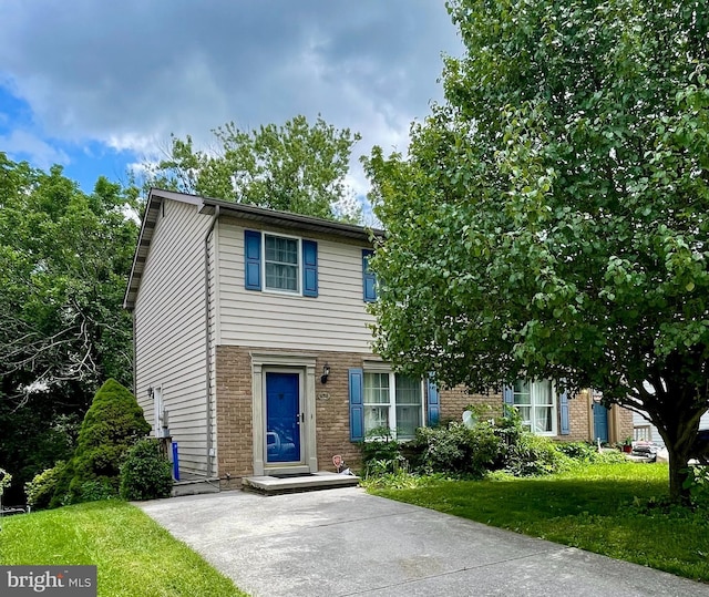 858 Mcallister St, Hanover, PA 17331 - view of front of home featuring a front yard and brick siding