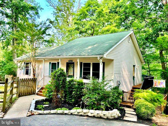 11517 Wrangler Rd, Lusby, MD 20657 - view of front facade with covered porch