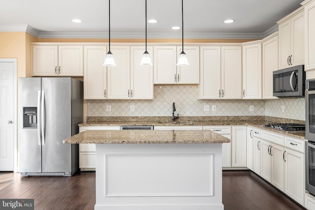 9 Fila Way, Sparks Glencoe, MD 21152 - kitchen with appliances with stainless steel finishes, crown molding, dark wood-style floors, pendant lighting, and a center island
