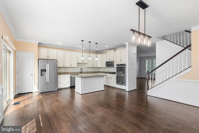 9 Fila Way, Sparks Glencoe, MD 21152 - kitchen with stainless steel appliances, dark wood-type flooring, decorative backsplash, a center island, and open floor plan