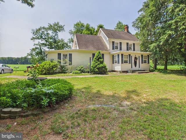 12194 Knife Box Rd, Greensboro, MD 21639 - colonial-style house with a chimney, a front lawn, and roof with shingles