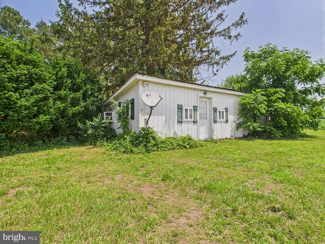 12194 Knife Box Rd, Greensboro, MD 21639 - view of side of property featuring a lawn and board and batten siding