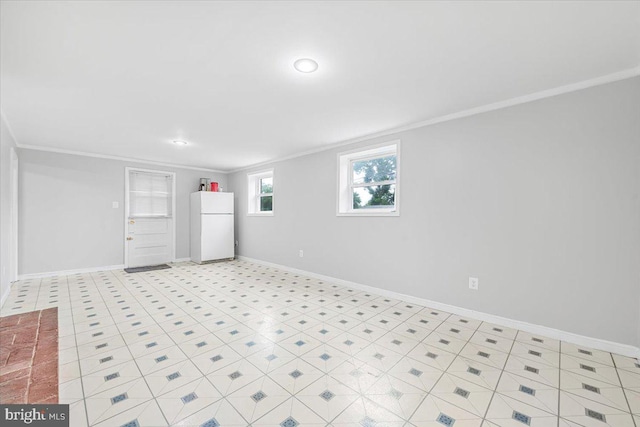 12329 La Plata St, Silver Spring, MD 20904 - below grade area with freestanding refrigerator, ornamental molding, and recessed lighting