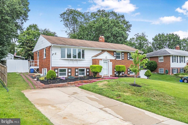 12329 La Plata St, Silver Spring, MD 20904 - raised ranch featuring brick siding and a chimney