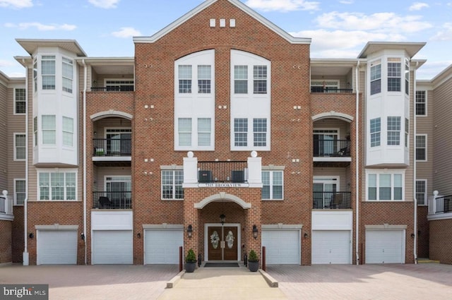 7315 Brookview Rd Unit 306, Elkridge, MD 21075 - view of property with a garage and driveway