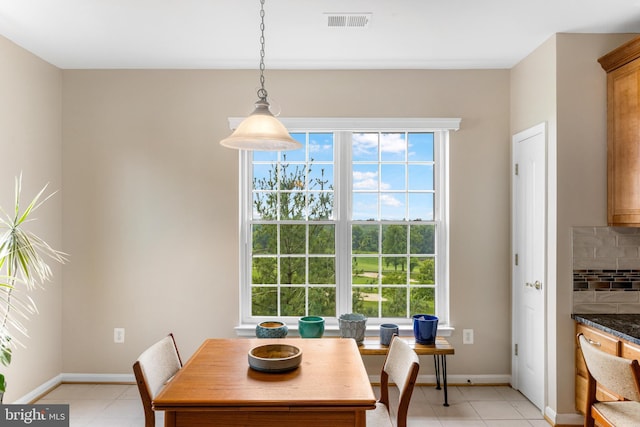 7315 Brookview Rd Unit 306, Elkridge, MD 21075 - dining room with plenty of natural light and light tile patterned floors