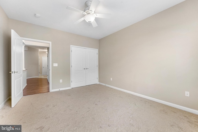 7315 Brookview Rd Unit 306, Elkridge, MD 21075 - unfurnished bedroom featuring carpet, a closet, and a ceiling fan