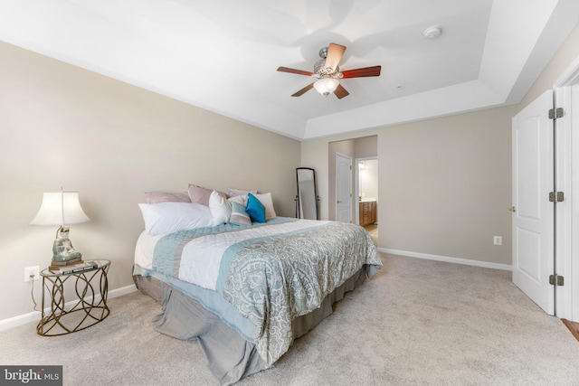7315 Brookview Rd Unit 306, Elkridge, MD 21075 - bedroom featuring a raised ceiling, carpet, a ceiling fan, and connected bathroom