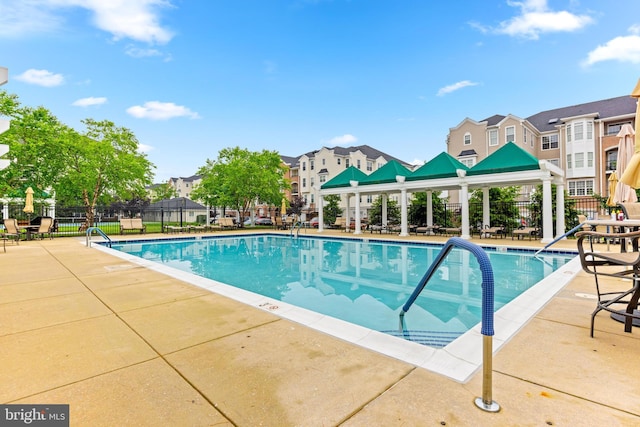 7315 Brookview Rd Unit 306, Elkridge, MD 21075 - community pool featuring a gazebo and a patio area