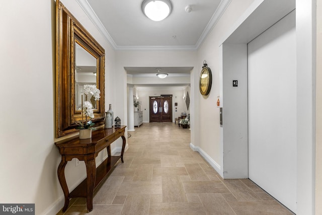 7315 Brookview Rd Unit 306, Elkridge, MD 21075 - hallway featuring elevator, crown molding, and light stone finish flooring