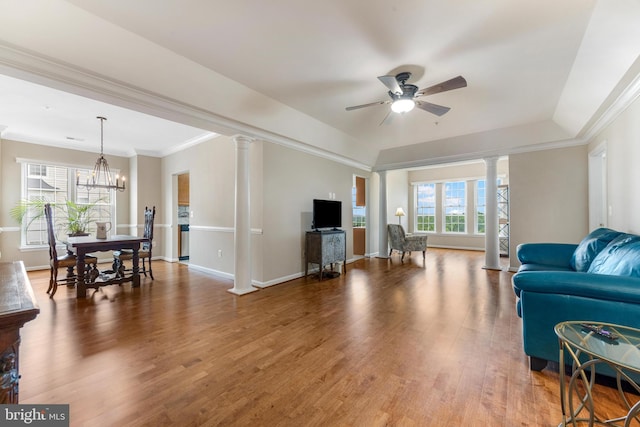 7315 Brookview Rd Unit 306, Elkridge, MD 21075 - living room featuring ornate columns, plenty of natural light, wood finished floors, and ornamental molding
