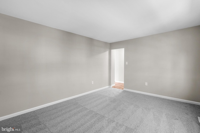 203 Watts Branch Pkwy, Rockville, MD 20850 - unfurnished room with baseboards and carpet