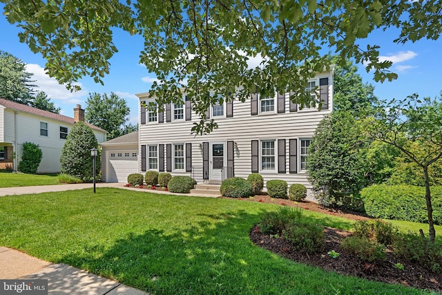 203 Watts Branch Pkwy, Rockville, MD 20850 - colonial inspired home with a garage, driveway, and a front lawn
