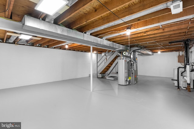 203 Watts Branch Pkwy, Rockville, MD 20850 - unfinished below grade area featuring water heater and stairway