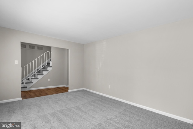 203 Watts Branch Pkwy, Rockville, MD 20850 - carpeted empty room featuring stairs and baseboards