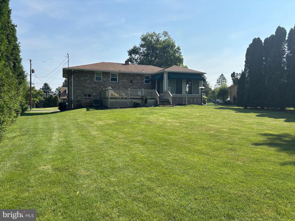3332 Groton Ln, Dover, PA 17315 - back of property with a deck and a lawn