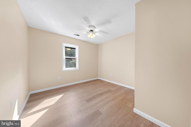 43 Walnut St, Little Egg Harbor Twp, NJ 08087 - spare room with ceiling fan, light wood-type flooring, and a textured ceiling