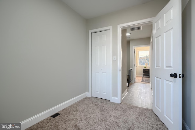 3027 Seamon Ave, Baltimore, MD 21225 - unfurnished bedroom featuring light carpet and a closet