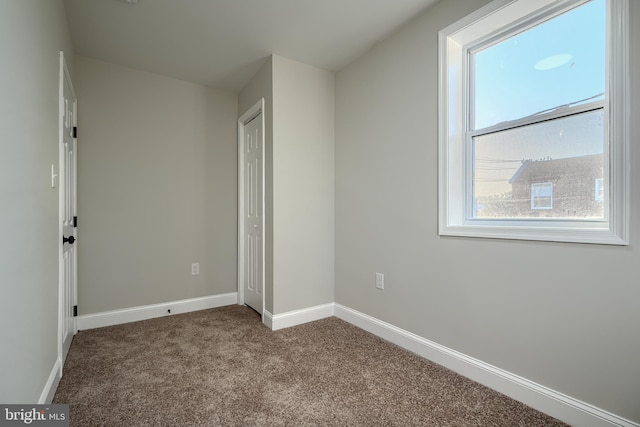 3027 Seamon Ave, Baltimore, MD 21225 - unfurnished bedroom with carpet and baseboards