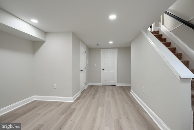3027 Seamon Ave, Baltimore, MD 21225 - basement with light wood-type flooring, recessed lighting, and stairs