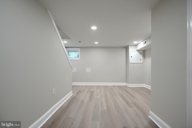 3027 Seamon Ave, Baltimore, MD 21225 - below grade area with light wood-style flooring and recessed lighting
