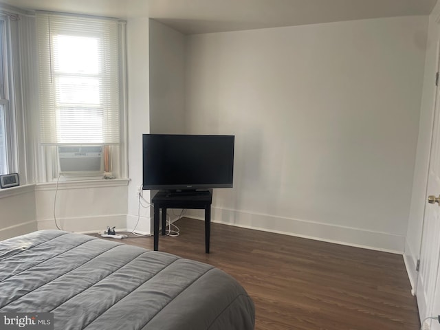1921 S Ithan St, Philadelphia, PA 19143 - bedroom with wood finished floors and cooling unit