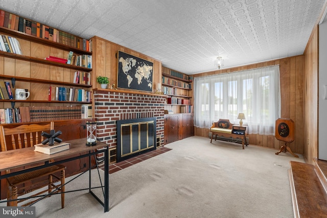 18 Linda Ln, Hatboro, PA 19040 - office with wooden walls, carpet flooring, a brick fireplace, built in shelves, and an ornate ceiling