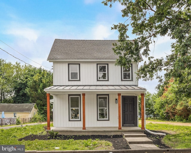 33 Main St, Pilesgrove, NJ 08098 - modern farmhouse style home featuring a standing seam roof, covered porch, a metal roof, roof with shingles, and board and batten siding