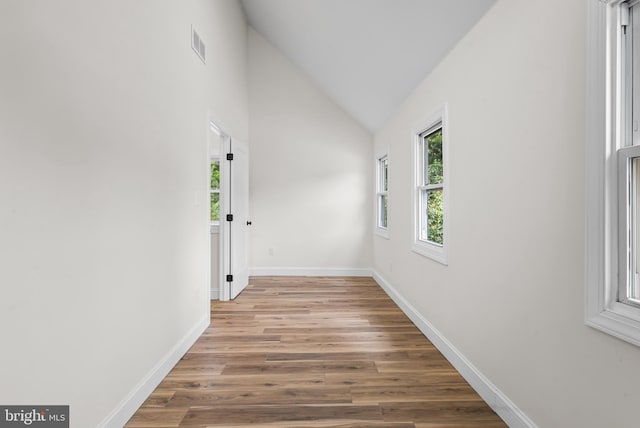 33 Main St, Pilesgrove, NJ 08098 - spare room with wood finished floors and high vaulted ceiling