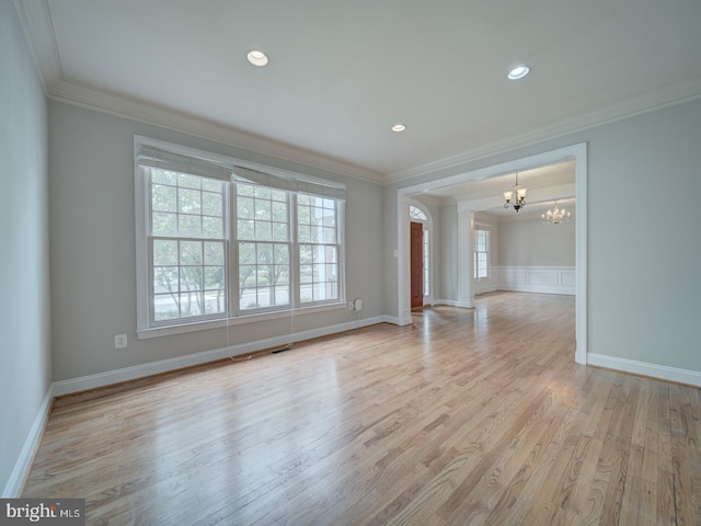 8429 Link Hills Loop, Gainesville, VA 20155 - empty room with a chandelier, ornamental molding, plenty of natural light, wood finished floors, and recessed lighting