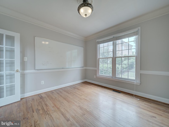 8429 Link Hills Loop, Gainesville, VA 20155 - empty room with healthy amount of natural light, crown molding, and wood finished floors