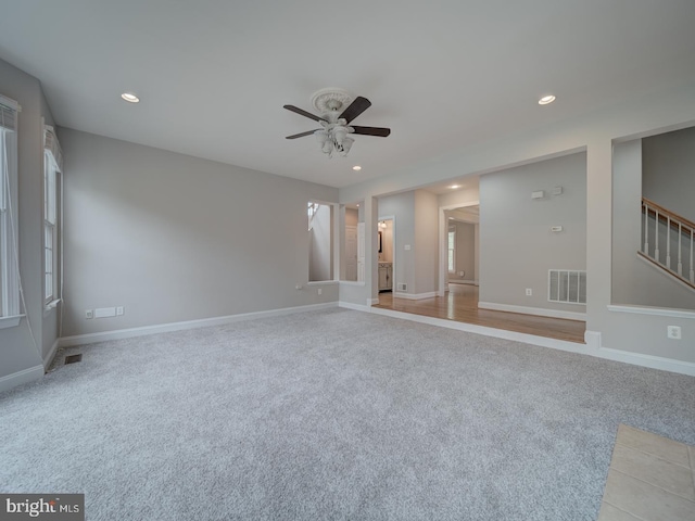8429 Link Hills Loop, Gainesville, VA 20155 - empty room featuring carpet flooring, ceiling fan, recessed lighting, and stairs