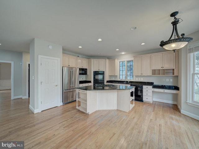 8429 Link Hills Loop, Gainesville, VA 20155 - kitchen with open shelves, black appliances, light wood finished floors, dark countertops, and a center island